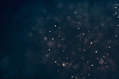 glitter lights defocused background. bokeh dark illustration