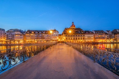 nigth view of city center of lucerne with famous chapel bridge and lake lucerne (vierwaldstatersee), canton of lucerne, switzerland