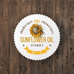 sunflower oil emblem over wooden background