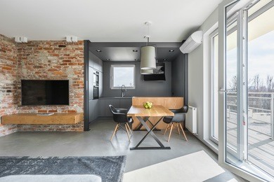 living and dining space in contemporary styled flat