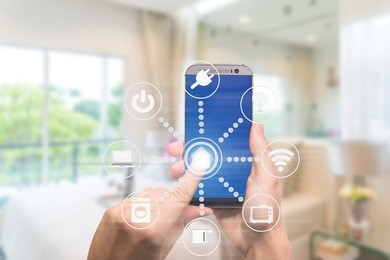 smart home automation app on mobile with home interior in background. internet of things concept at home. smart technology 4.0