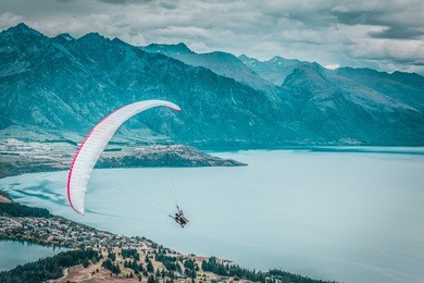 paragliding with instructor above lake wakatipu, queensland, otago, new zealand