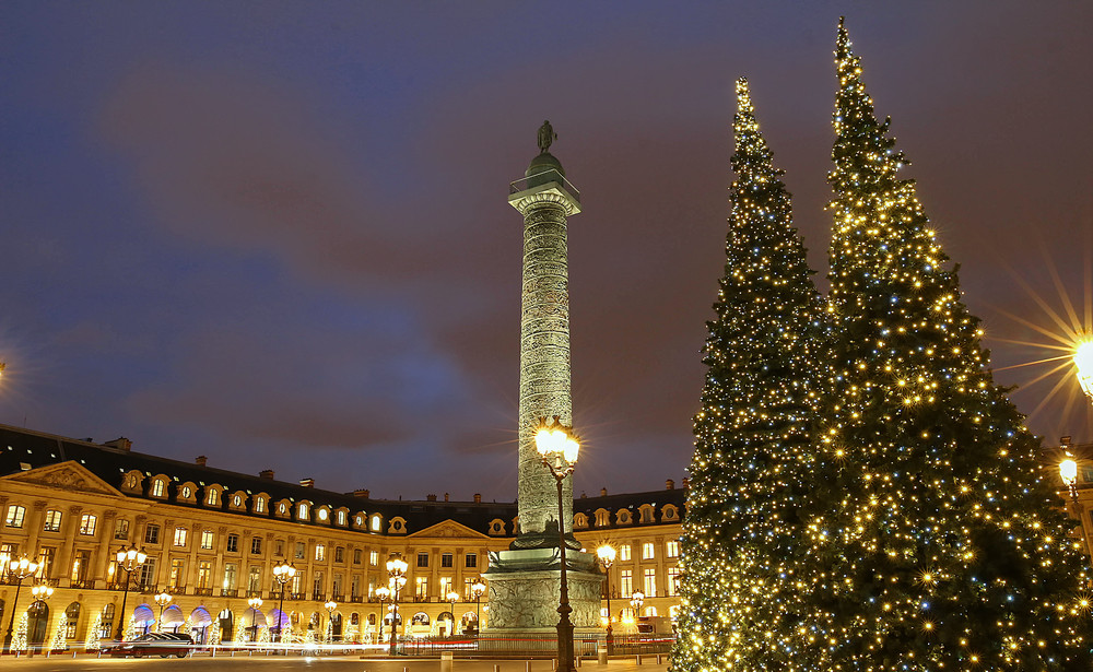 the place vendome decorated for christmas at night, paris, france.