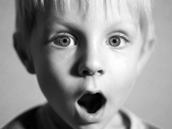 black and white portrait of cute caucasian boy