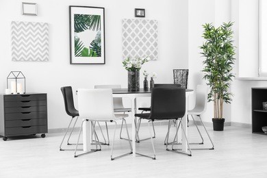 modern room interior with big table and chairs