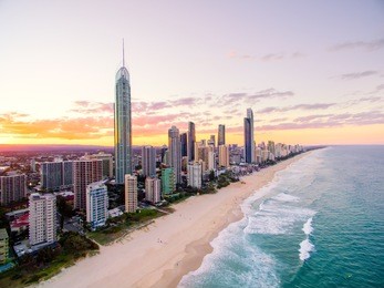 an aerial view of surfers paradise on the gold coast in queensland, australia at sunset 