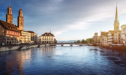 zurich city center with famous fraumunster, grossmunster and st. peter and river limmat, switzerland