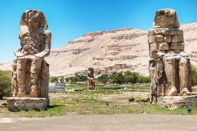 the colossi of memnon - two massive stone statues of pharaoh amenhotep iii
