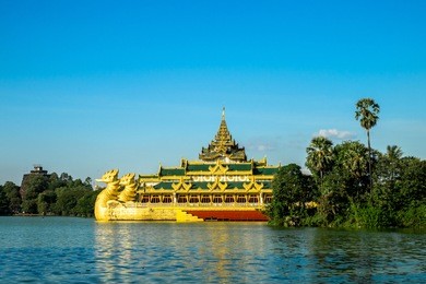 view of karaweik hall, a asian palace on the eastern shore of kandawgyi lake, yangon, myanmar. yangon is a former capital of myanmar (burma).