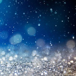 christmas light background.  holiday glowing backdrop. defocused background with blinking stars. blurred bokeh.