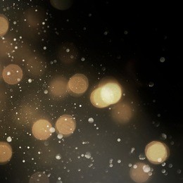christmas light background.  holiday glowing backdrop. defocused background with blinking stars. blurred bokeh.