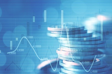 double exposure rows of coins of graph on the table,finance and business concept,money,soft focus and blurred style,dark tone.
