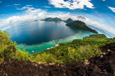 (fish-eye view), gypsy village in mabul bodgaya island in tun sakaran marine park,semporna,sabah.clear blue water,beautiful vacation spot,treatment & aquatics.scenic panoramic top view of bohey dulang