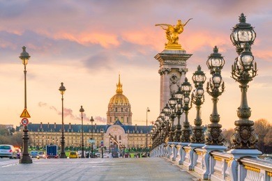 the alexander iii bridge across seine river in paris, france at sunrise