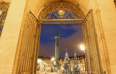 the place vendome decorated for christmas at night, paris, france.