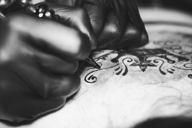 master tattoo woman on her back