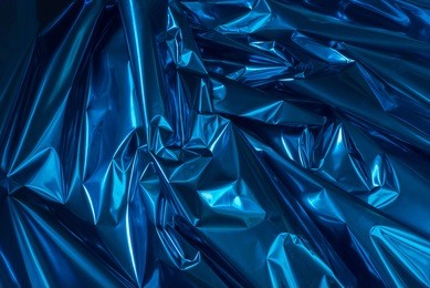 blue color folded metallic foil abstract bacgkground