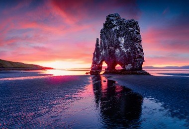 huge basalt stack hvitserkur on the eastern shore of the vatnsnes peninsula. colorful summer sunrise in northwest iceland, europe. beauty of nature concept background.
