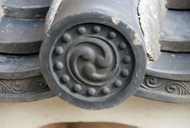 roof tile of eaves, traditional japanese style. the part of a roof that meets or overhangs the walls of a building.