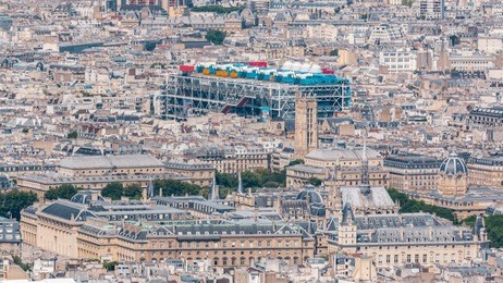 top view of paris skyline from above timelapse. main landmarks of european megapolis with centre of pompidou. bird-eye view from observation deck of montparnasse tower. paris, france