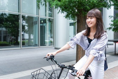 business woman riding a bicycle