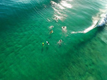 surfers at burleigh heads, gold coast.