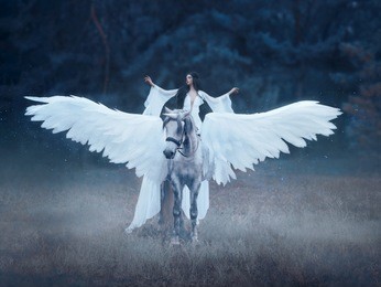 beautiful, young elf, walking with a unicorn. she is wearing an incredible light, white dress. artistic photography
