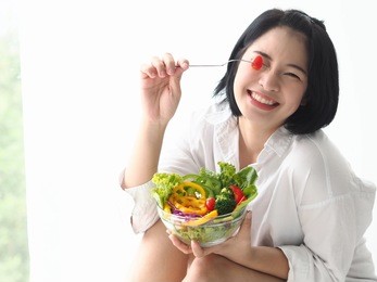 'happy young asian woman with fresh vegetable and fresh fruit,healthy concept.