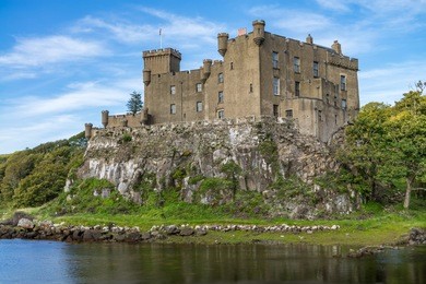 dunvegan castle and harbour on the island of skye, scotland