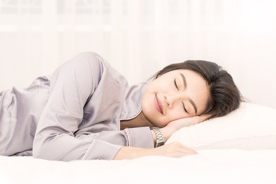 asian woman sleep and sweet dream on bed in the morning