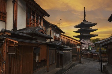 yasaka pagoda and sannen zaka street under sunset in kyoto, japan
