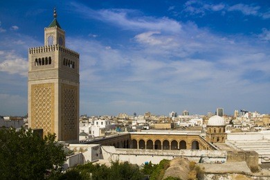 view of the al-zaytuna mosque and the skyline of tunis