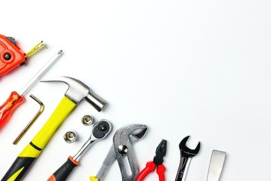 top view of working tools on white background.flat lay design for construction concept.