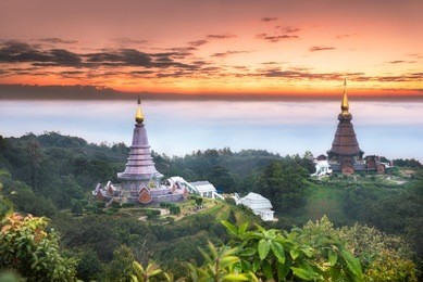 landscape of two pagoda on the top of inthanon mountain at morning sunrise, view point from kew mae pan nature trail on doi inthanon national park, chiang mai, thailand.