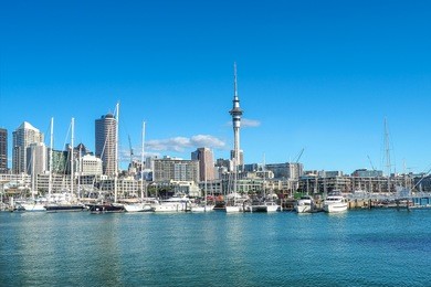 auckland skyline with the landmark, sky tower, in new zealand.