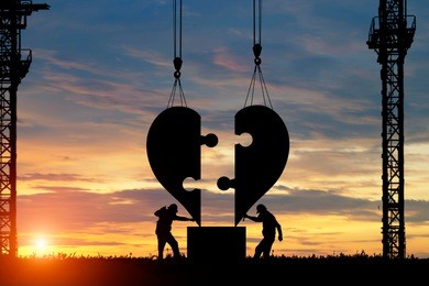 silhouette of engineer heart shape builder in construction. valentines day