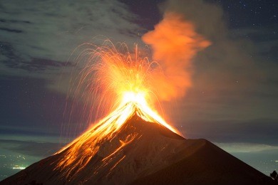 volcano eruption at night - volcano fuego in antigua, guatemala