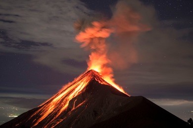 lava going down the volcano fuego in antigua, guatemala, right after an eruption.