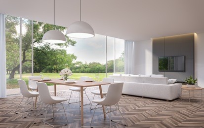 modern dining and living room with garden view 3d rendering image.the rooms have wooden floors ,there are large open doors. overlooks wooden terrace and large garden.