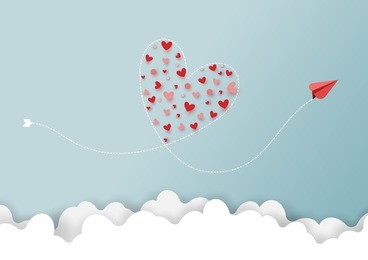 paper art style of valentine's day greeting card and love concept.red airplanes flying look like heart shape on clouds and blue sky.vector illustration.