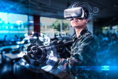the abstract image of the soldier use a vr glasses for combat simulation training overlay with the hologram. the concept of virtual hologram, simulation, gaming, internet of things and future life.