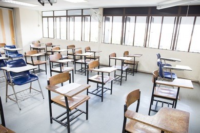 front view abstract background of examination room or classroom with undergraduate students inside