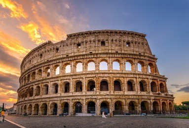 sunrise view of colosseum in rome, italy