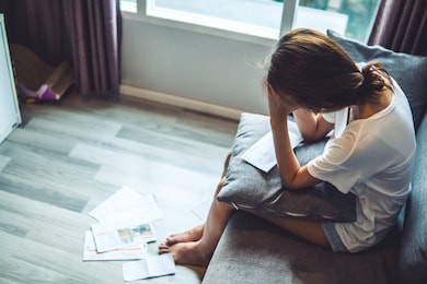 young women worried about bills