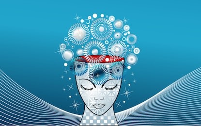 creativity - ideas represented by snowflakes,flowers emerging from beautiful female face / head