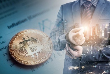 double exposure of businessman and city night background with bitcoin on graph report, bitcoin btc the new virtual electronic money. investment concept