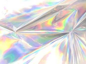 holographic iridescent color wrinkled foil. real hologram background of wrinkled abstract foil texture with multiple colors. 90s blue pastel holographics gradient mesh tamplate background or surface