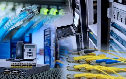 network device for data center in data center room. rj45 utp and fiber optic cable , ip telephone and gigabit switch, computer server and monitor display.