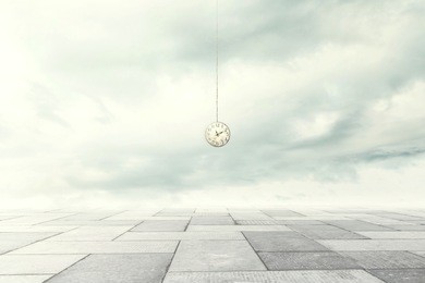 surreal moment of a clock coming down from the sky