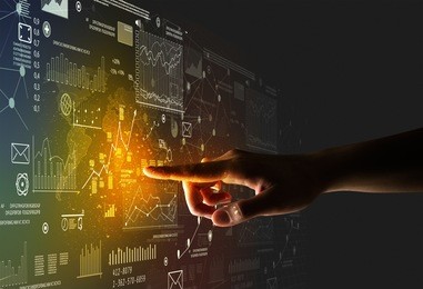female finger touching a beam of light surrounded by charts and graphs
